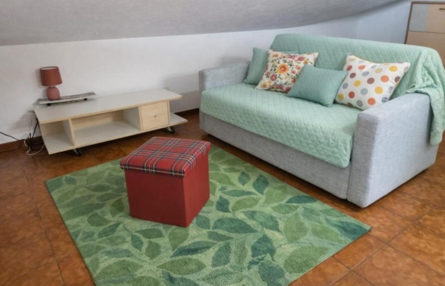 The sofa bed in the living area